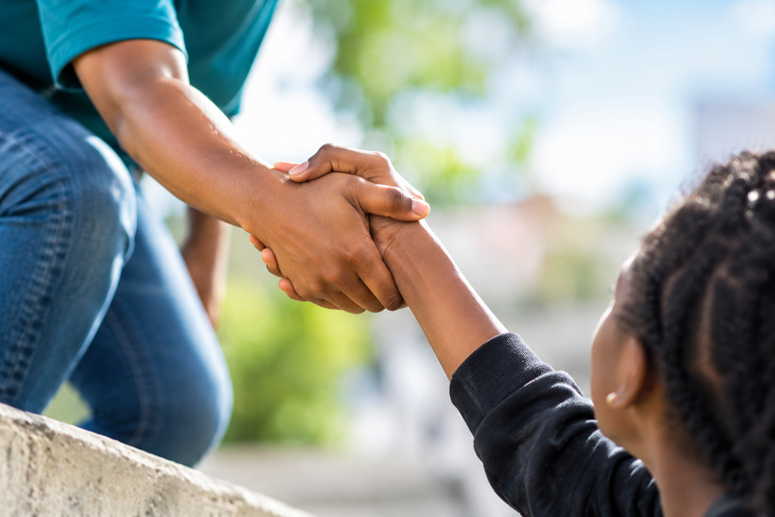 Volunteer supporting children